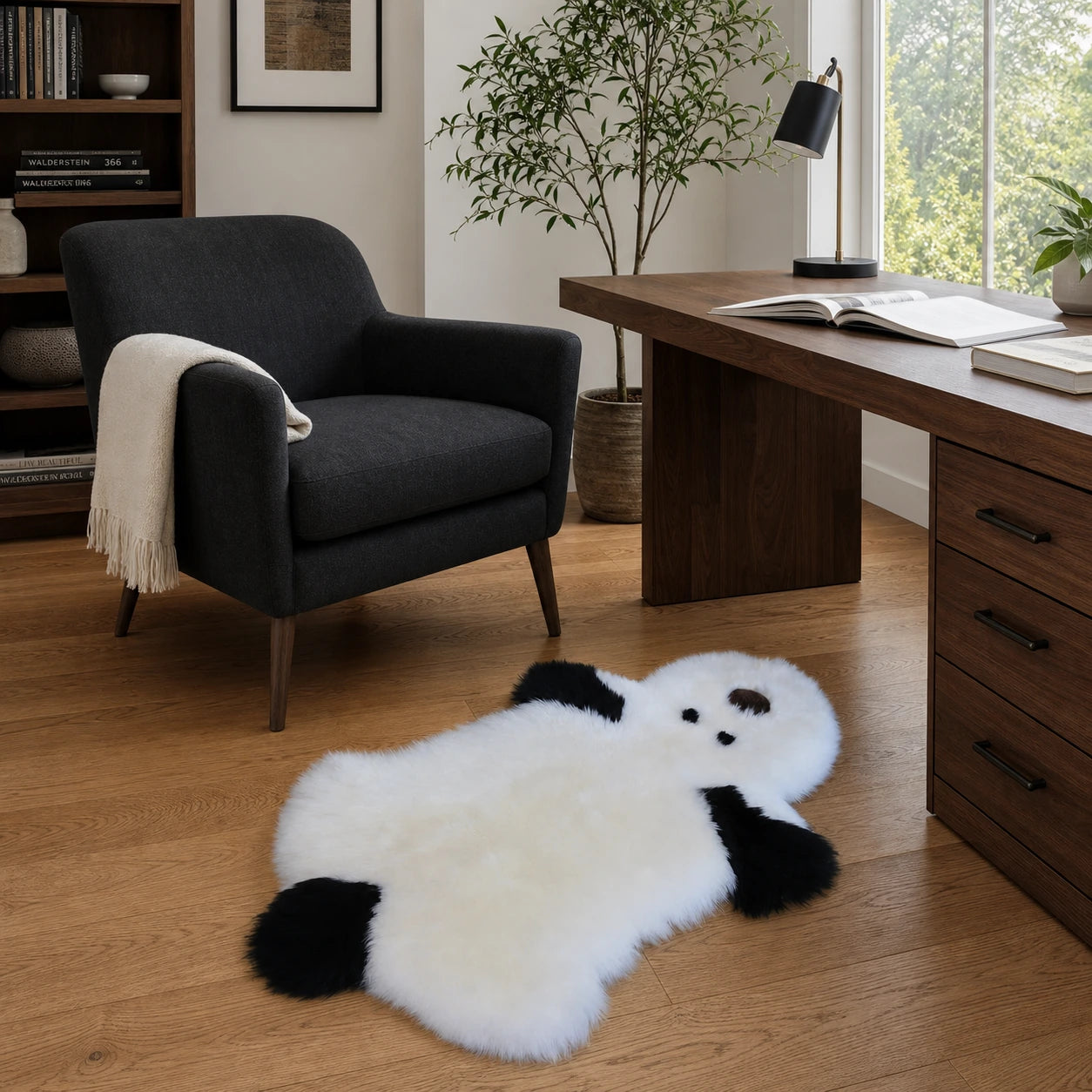 Capricornus Living White and black genuine sheepskin puppy rug in an American home office