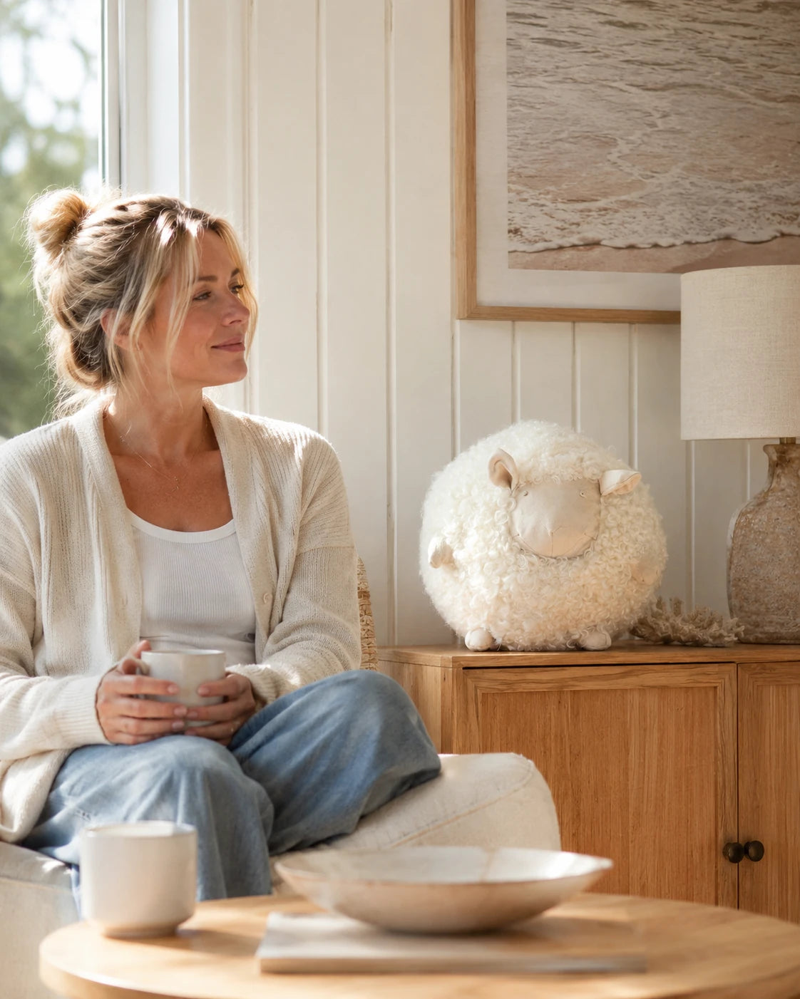 Capricornus Living Cream White sheep pillow in a calm living room
