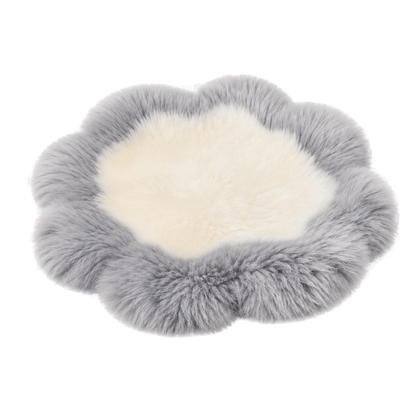 Capricornus Living Silver Gray Border and Ivory Center genuine sheepskin flower chair pad on a transparent background