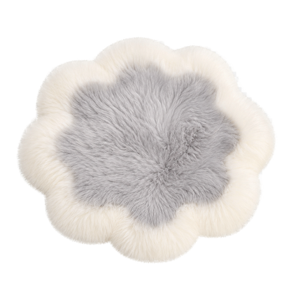 Capricornus Living Ivory Border and Silver Gray Center genuine sheepskin flower chair pad on a transparent background