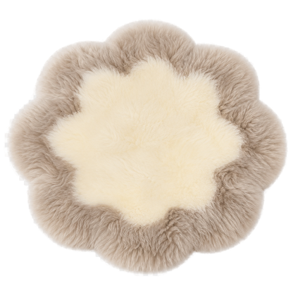 Capricornus Living Taupe Border and Ivory Center genuine sheepskin flower chair pad on a transparent background