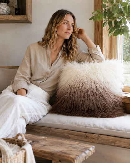 Capricornus Living Brown Gradient lamb wool pillow in a calm living room