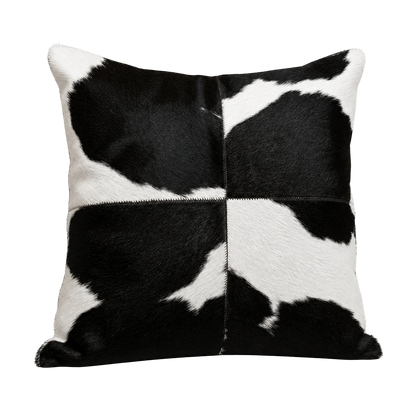 Black and white four-panel genuine cowhide square pillow on transparent background