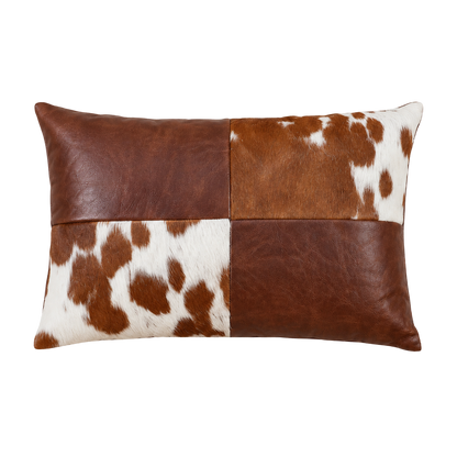 Cognac brown oil-waxed leather and brown-white cowhide lumbar pillow on transparent background