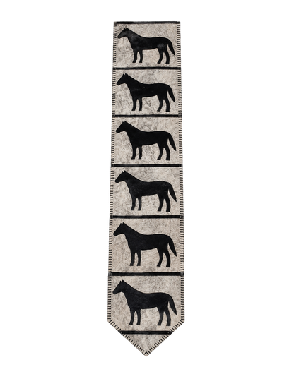 Capricornus Living Gray and Black Horse Motif genuine hair-on cowhide table runner on a transparent background