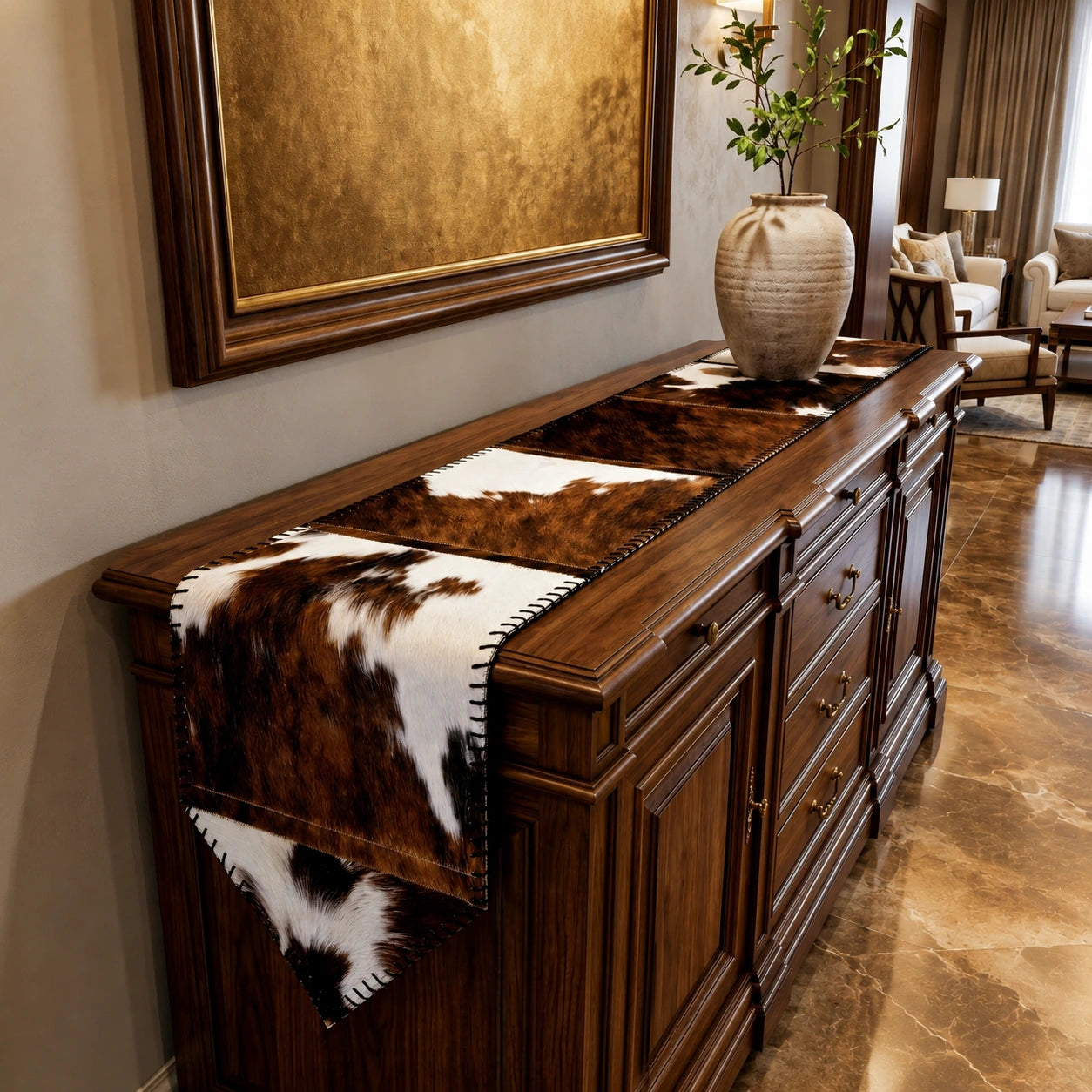 Capricornus Living Random Brown and White cowhide table runner styled on a console