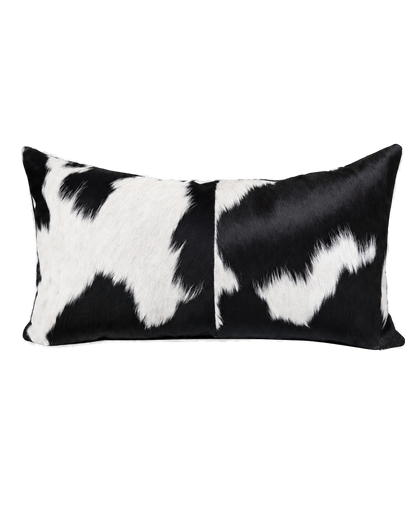Capricornus Living Black and White Spotted genuine hair-on cowhide lumbar pillow on a transparent background