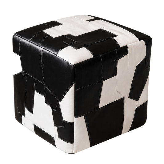 Black and ivory genuine leather patchwork cube ottoman on transparent background