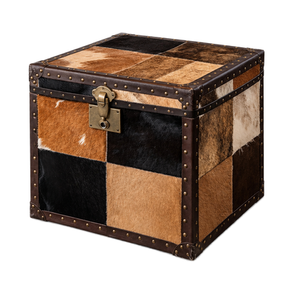 Capricornus Living Mocha Brown and Black Patchwork genuine hair-on cowhide storage trunk on a transparent background