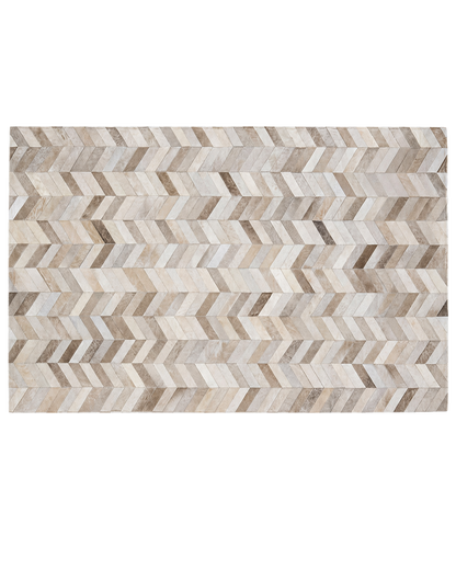 Capricornus Living Herringbone Beige genuine cowhide patchwork area rug on a transparent background
