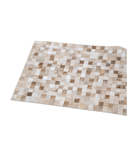 Capricornus Living Checkerboard Beige genuine cowhide patchwork rug angled on a transparent background
