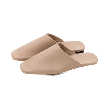 Capricornus Living Camel closed-toe genuine leather house slippers on a transparent background