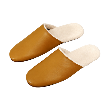 Capricornus Living Cognac genuine lambskin plush-lined house slippers on a transparent background