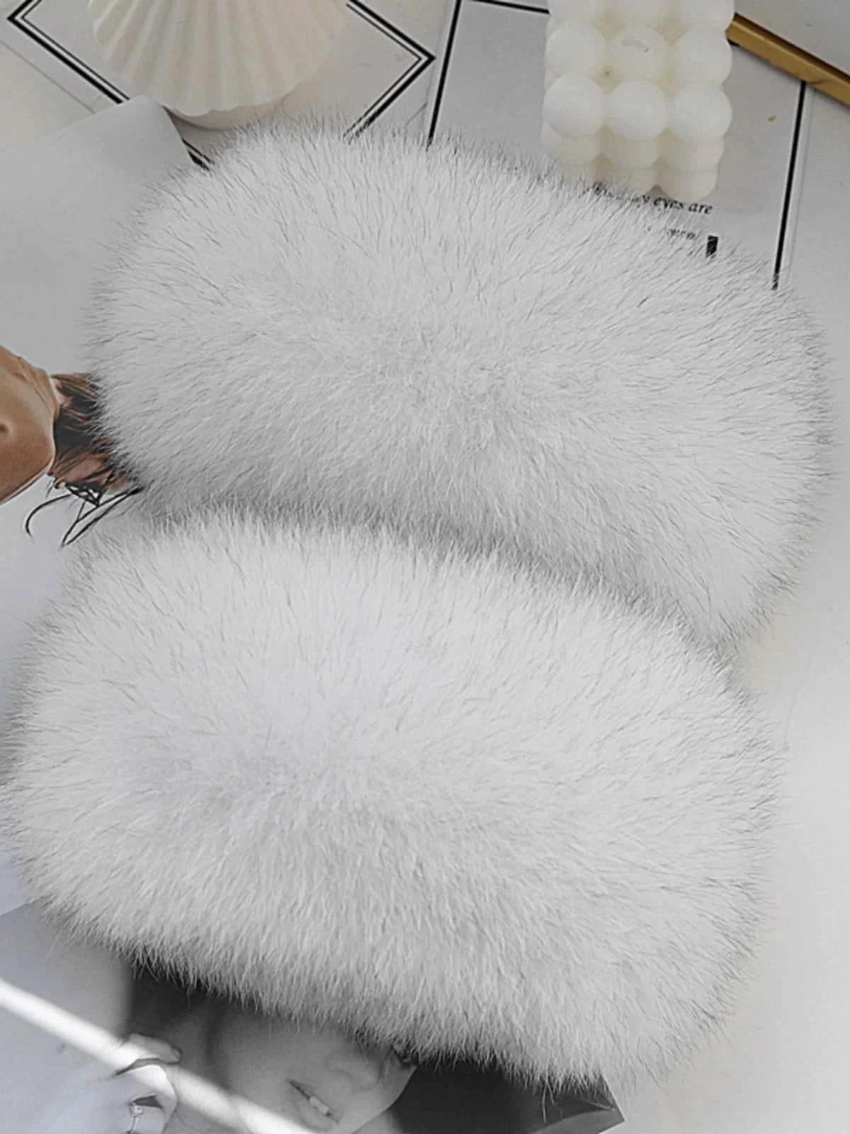Capricornus Living Snow White genuine natural fur cuff pair close-up showing pile direction and density