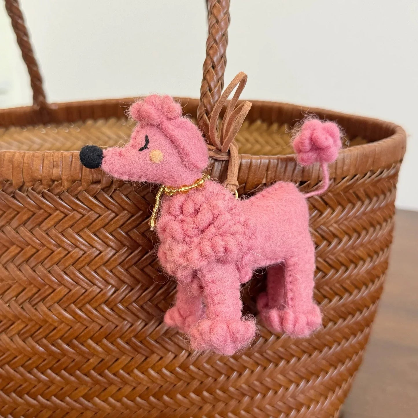 Pink handmade wool felt poodle bag charm with cord loop