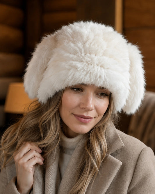 Natural White genuine rabbit fur bunny ear hat worn with winter coat