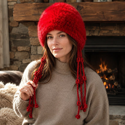 Heritage Red genuine rabbit fur knit earflap hat worn by fireplace