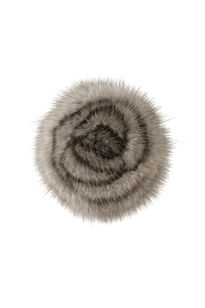 Silver Blue camellia flower brooch on a clean neutral background