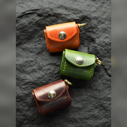 Top-grain cowhide earbud cases in Sunset Tan, Forest Green and Deep Brown