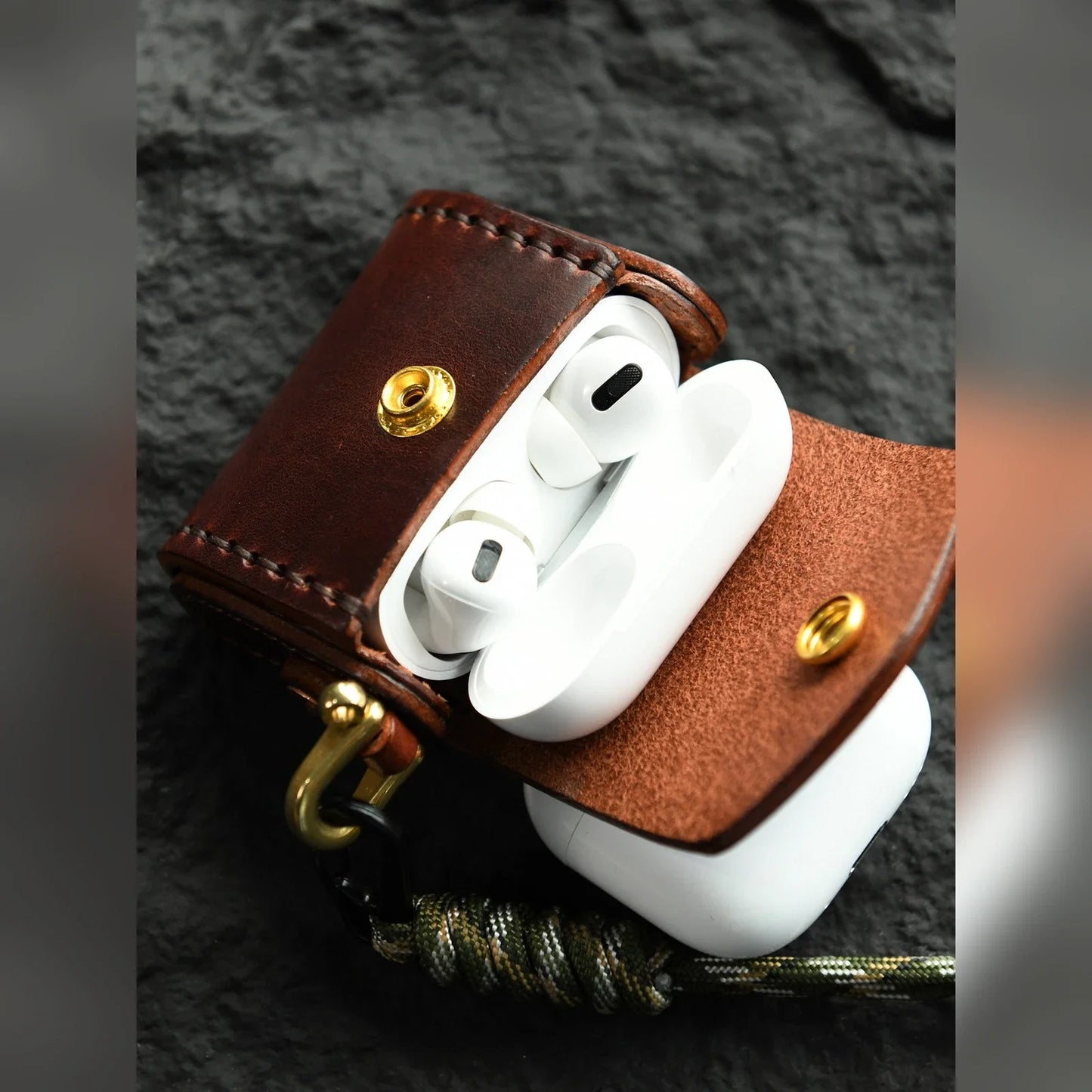 Deep Brown hand-stitched cowhide earbud case shown open
