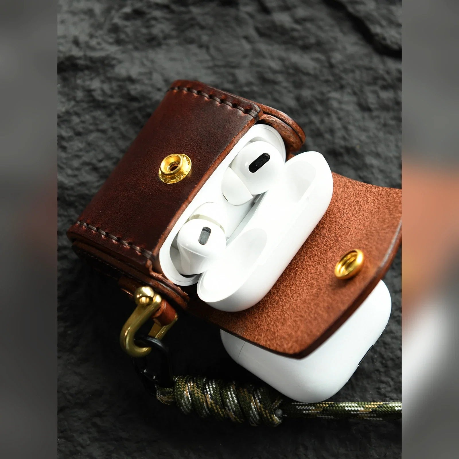 Deep Brown hand-stitched cowhide earbud case shown open