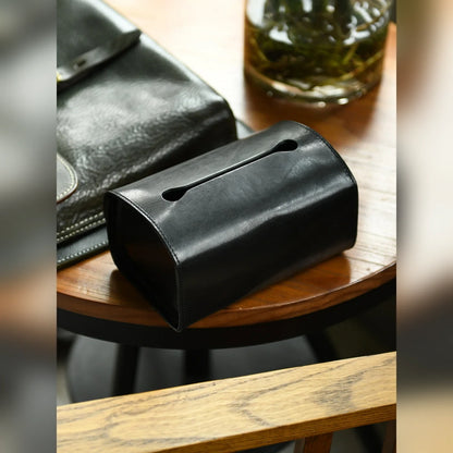 Black top-grain cowhide tissue box cover styled on a side table