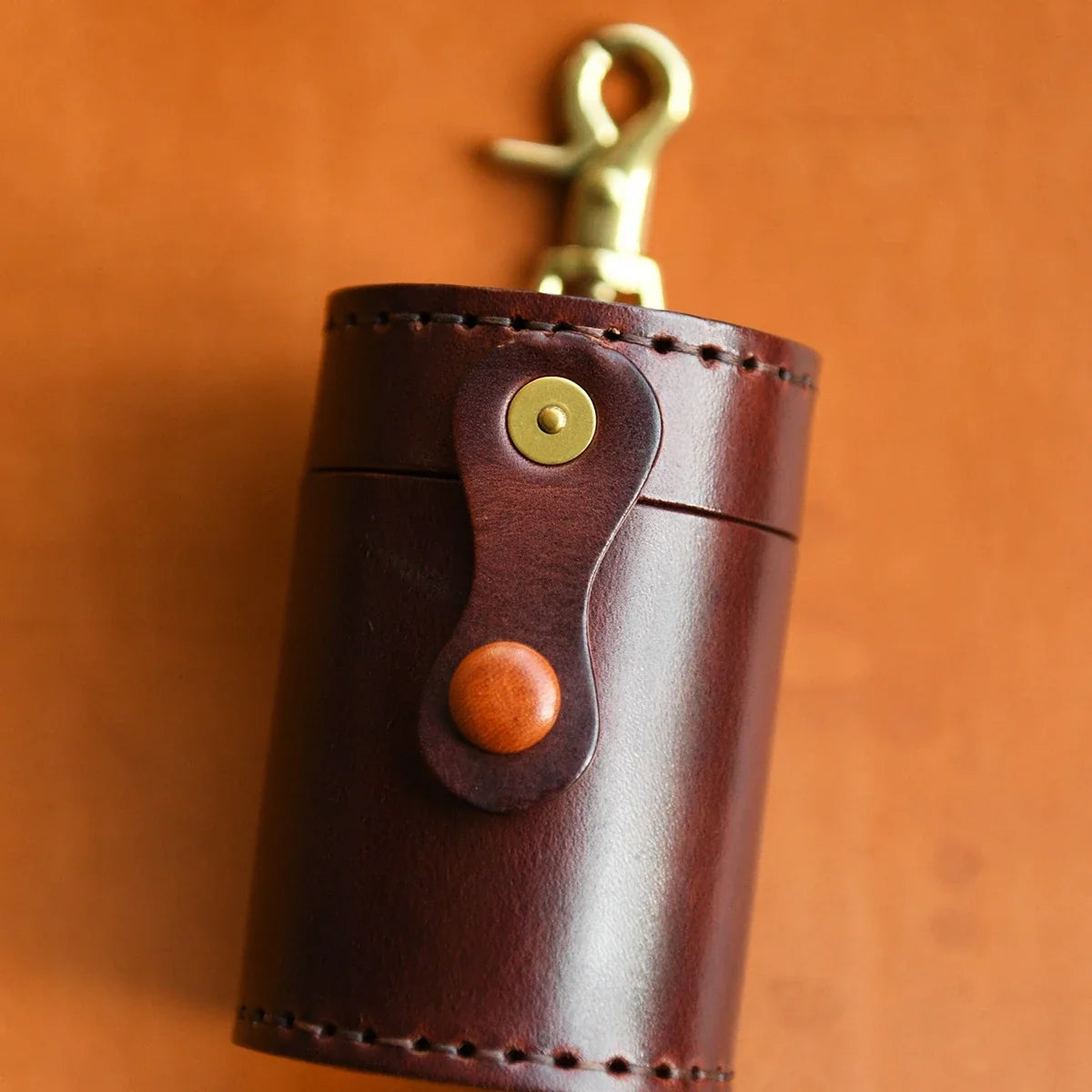 Vintage Brown leather cylindrical storage case with hook