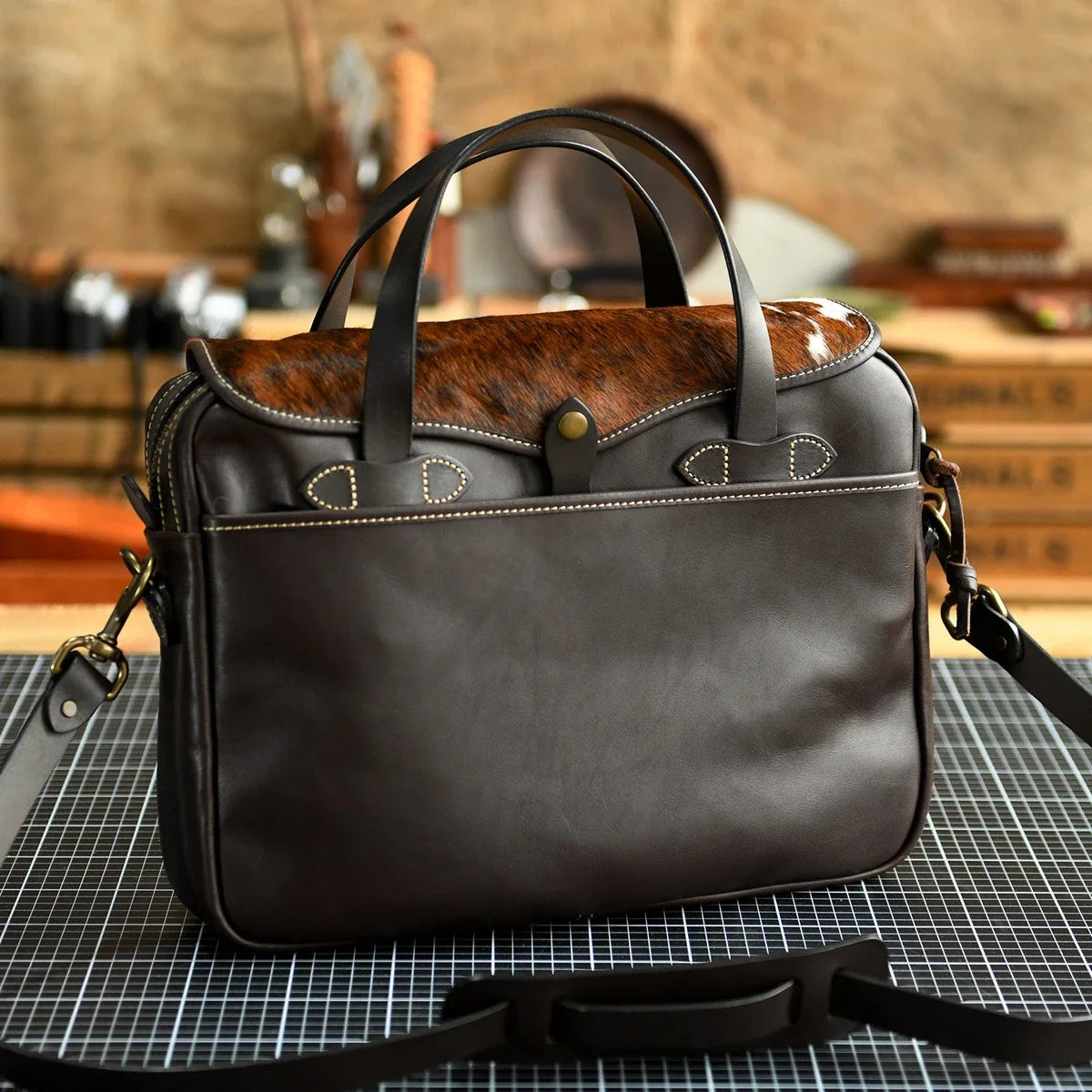 Top-grain leather briefcase with a hair-on hide flap