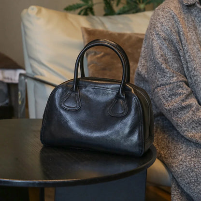 Black vegetable-tanned cowhide bowling bag front view