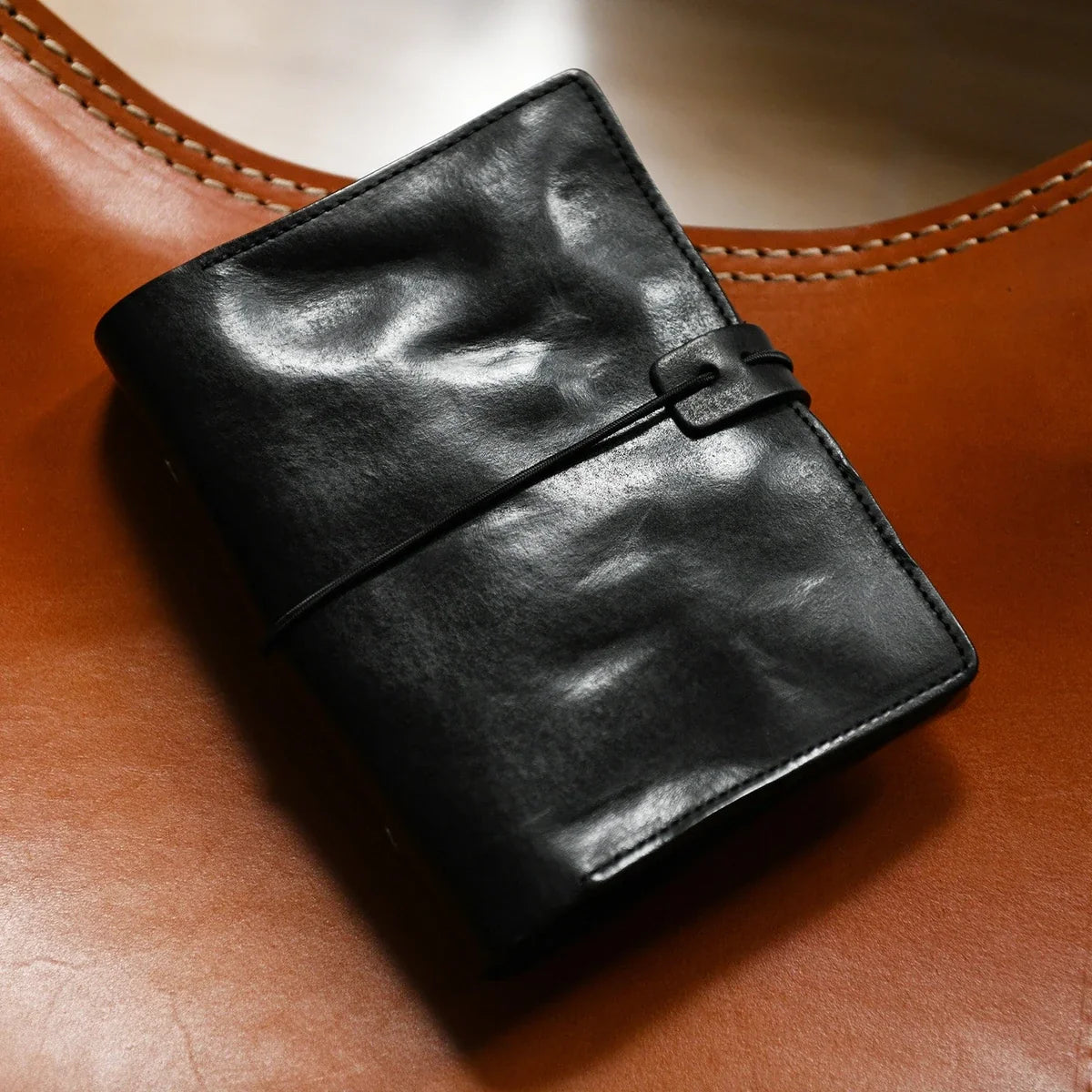 Black A6 leather journal with card-slot interior