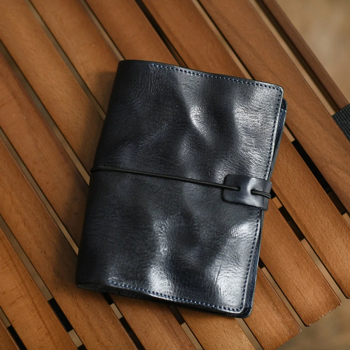 Deep navy A6 leather journal with card-slot interior