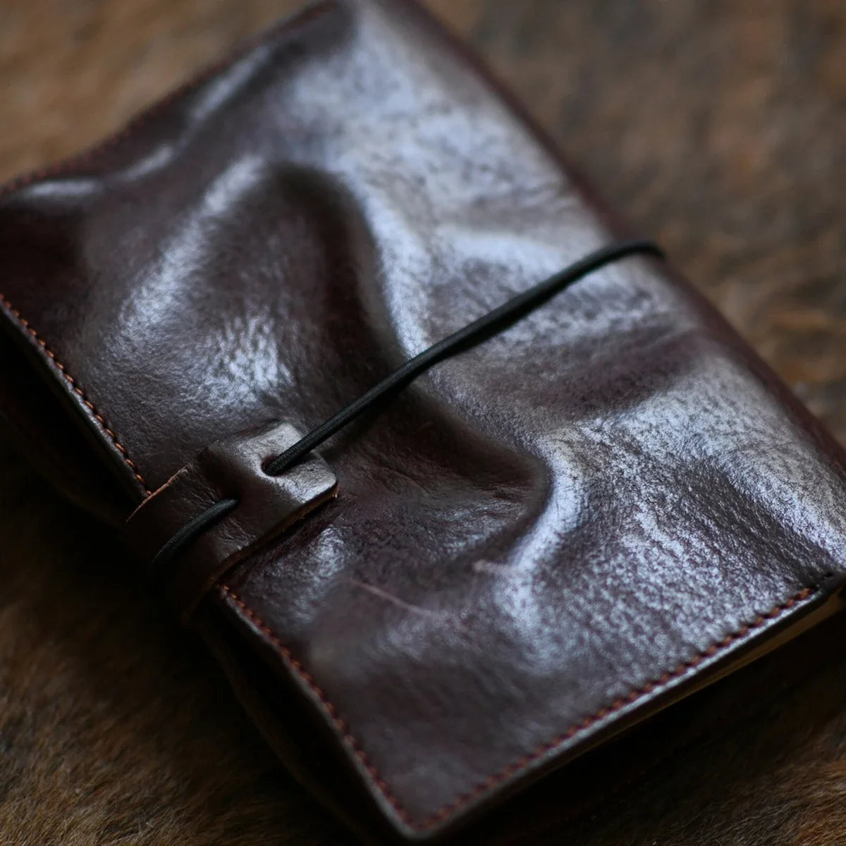 Handmade vegetable-tanned leather A6 ring journal in coffee brown