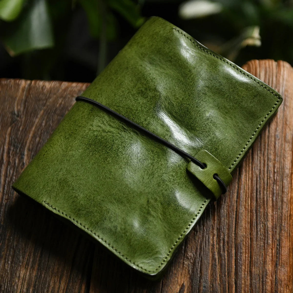 Moss green A6 leather journal with card-slot interior