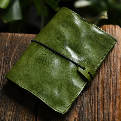 Moss green A6 leather journal with card-slot interior