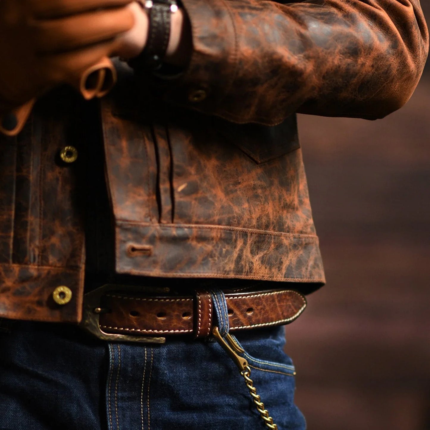 Vintage wallet chain worn with denim and leather