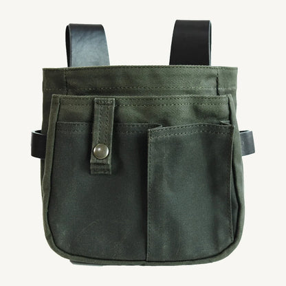 Waxed canvas and leather belt pouch on a clean background