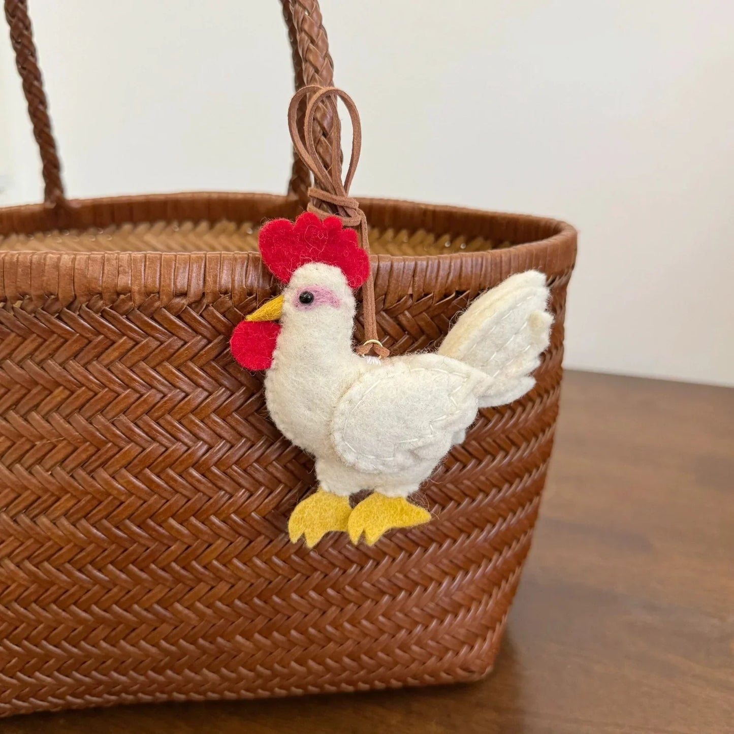 White wool felt hen bag charm with red comb and cord loop