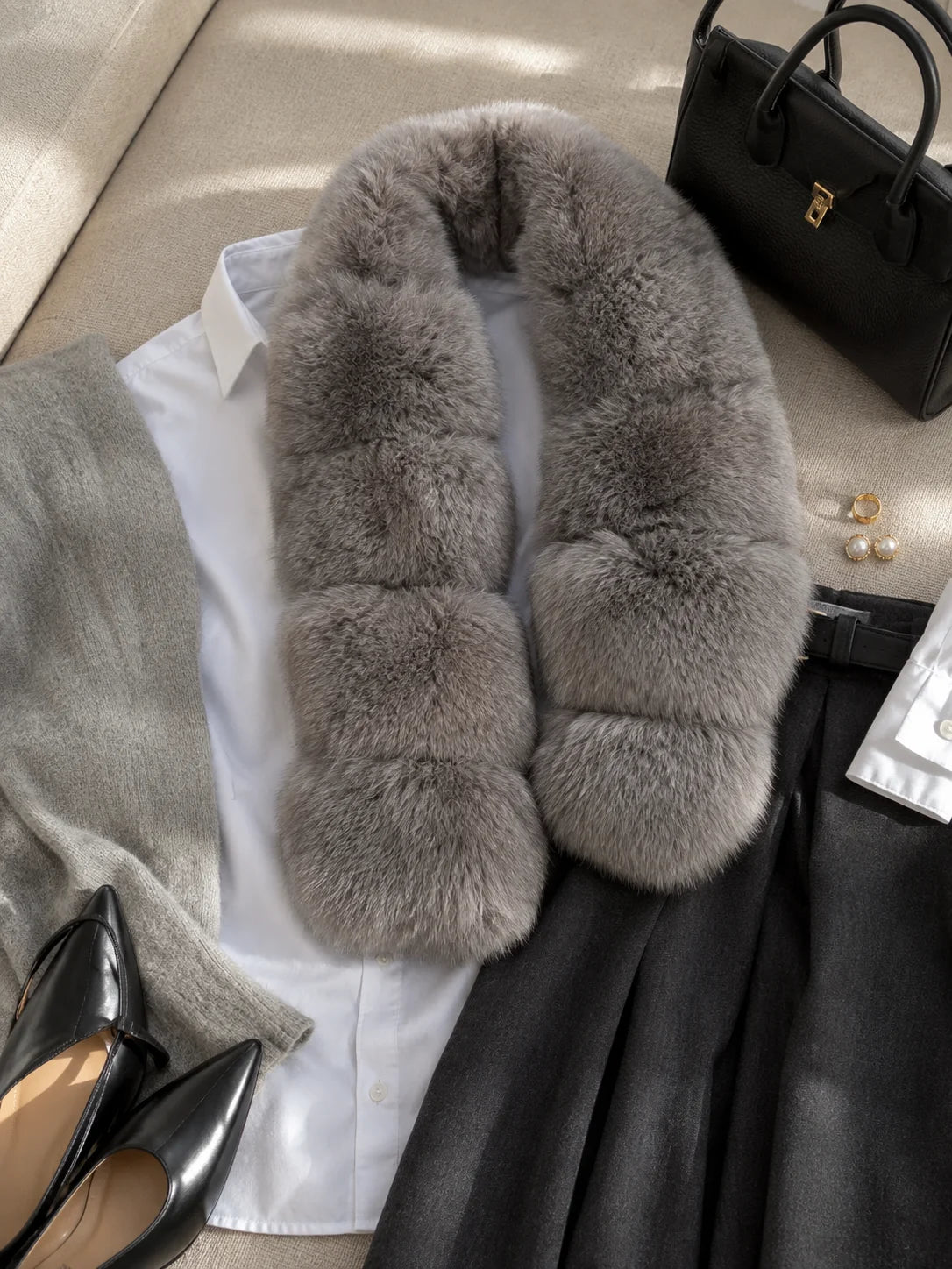 Gray taupe blue fox fur scarf styled with a monochrome outfit