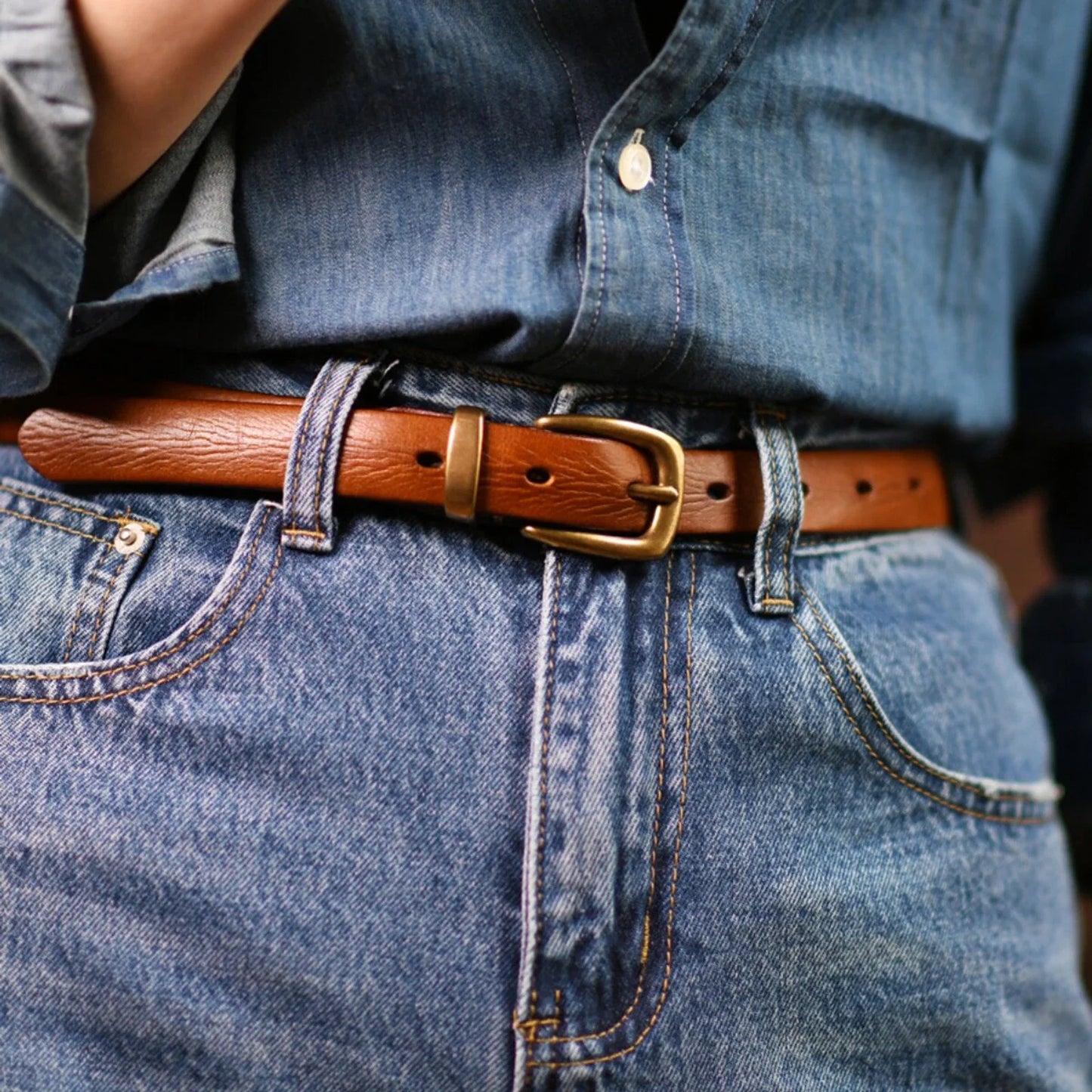 Cognac women's leather belt styled with denim