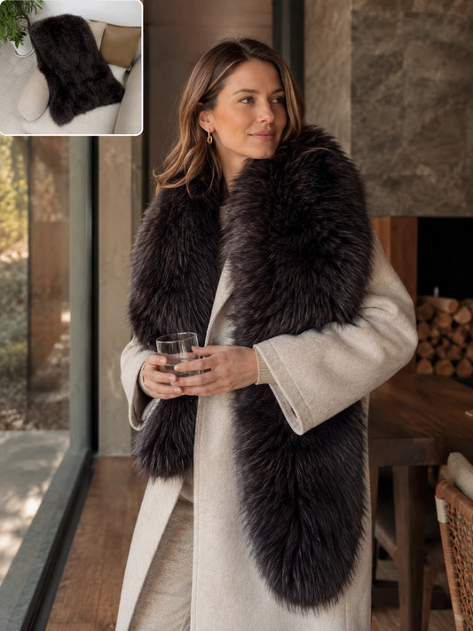 Woman wearing a Dark Chocolate Brown fox fur shawl beside a fireplace