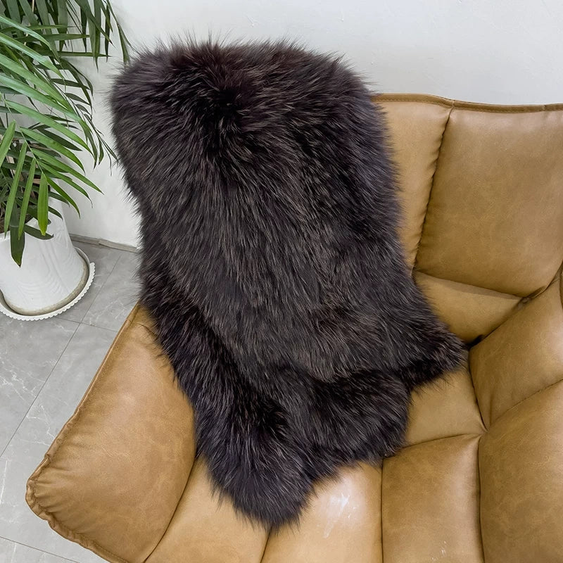 Dark Chocolate Brown genuine fox fur shawl arranged on a leather chair