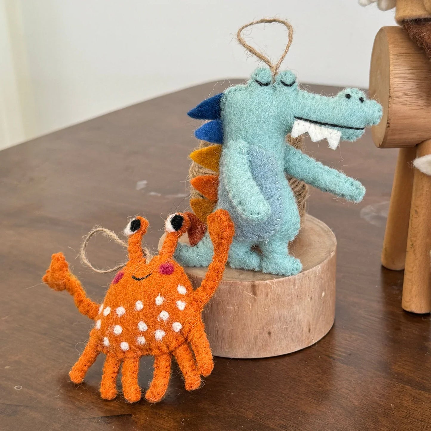 Handmade orange crab and blue crocodile wool felt bag charms