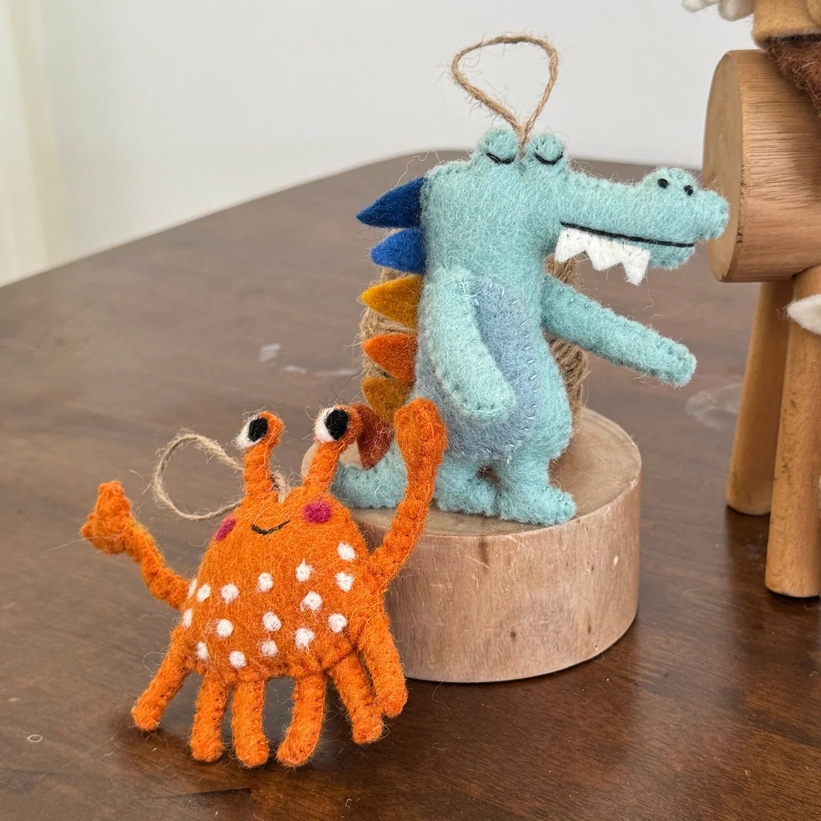 Handmade orange crab and blue crocodile wool felt bag charms