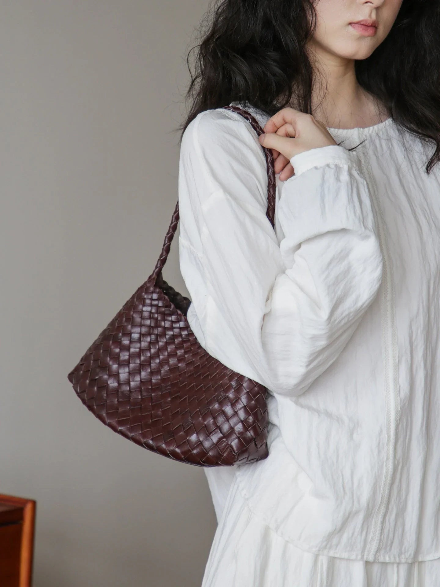 Coffee brown woven leather shoulder bag with braided strap detail